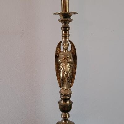 Lot 213: Antique Heavy Brass Alter Candleholder With An Angel and Mary, Jesus and Joseph on the base.