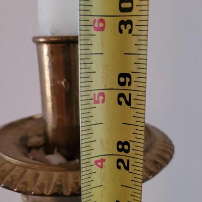 Lot 213: Antique Heavy Brass Alter Candleholder With An Angel and Mary, Jesus and Joseph on the base.