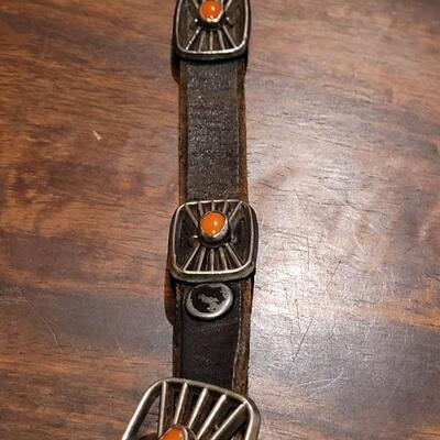 Lot 247:  Vintage Sterling and Coral Concho Belt