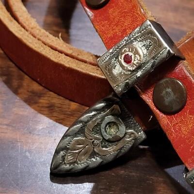 Lot 248: Pre-1948 Mexican Silver And Gold Plated Belt Buckle and Red Leather Belt