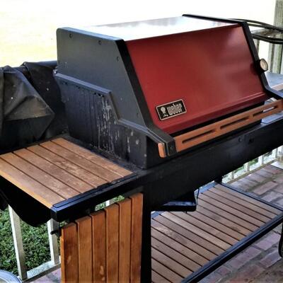 Lot #266  Weber Gas Grill with cover