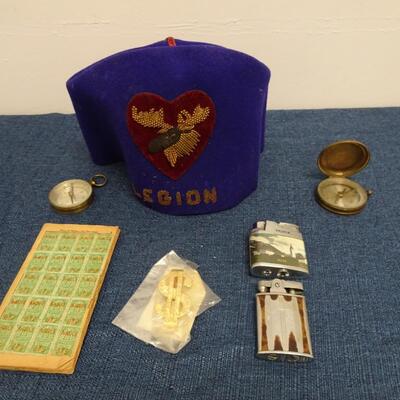 LOT 386. VINTAGE LEGION HAT, TWO COMPASS TWO LIGHTERS AND GREEN STAMP BOOK