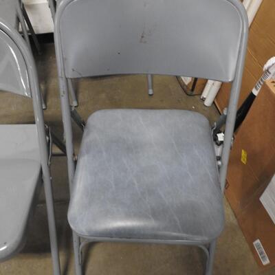 5 Folding Chairs, 4 Grey, 1 Padded Blue Chair