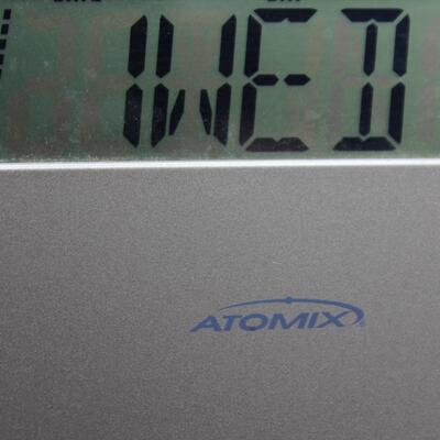 Atomix Battery Operated Wall or Table Clock Time, Date, and Thermometer