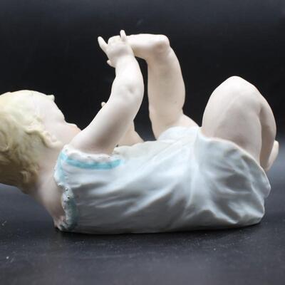 Antique Gebruder Heubach Porcelain Bisque Piano Baby Figurine