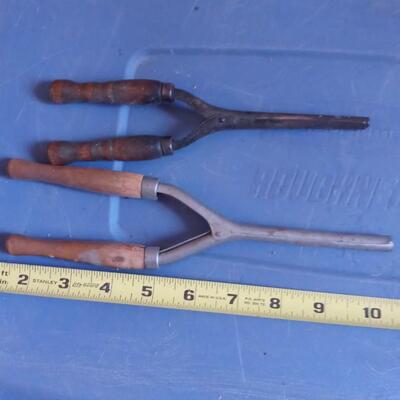 LOT 153  TWO OLD WOOD HANDLED CURLING IRONS