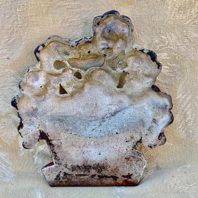 AA   ANTIQUE CAST IRON FLOWER POT DOOR STOP