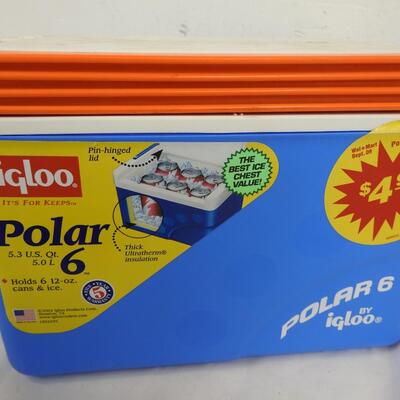 2 Small Coolers: 1 Blue Igloo Cooler with Orange Handle, Red Coleman Cooler