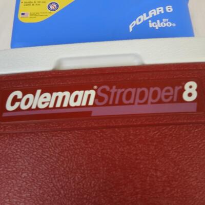 2 Small Coolers: 1 Blue Igloo Cooler with Orange Handle, Red Coleman Cooler