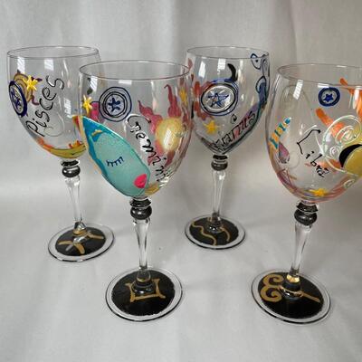Lot 78. Handprinted Zodiac Wine Glasses