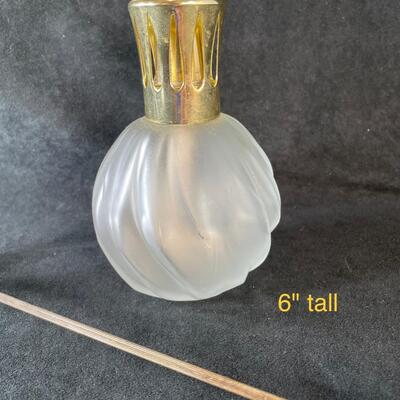 Lot 85. Lampe Berger and Fancy Snuffer