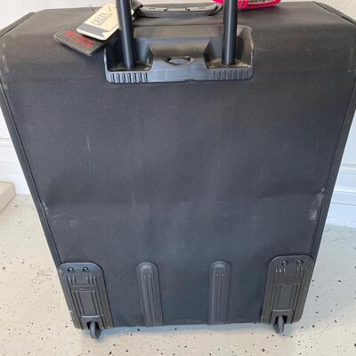 Lot 132. TUMI Large Suitcase