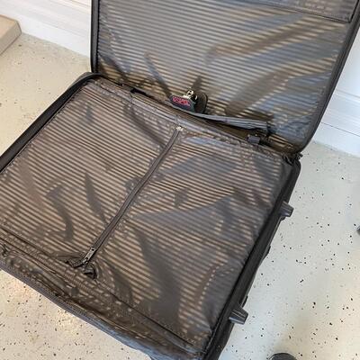Lot 132. TUMI Large Suitcase