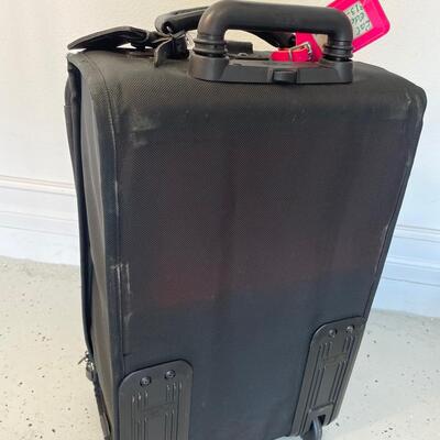 Lot 133  TUMI Medium Suitcase