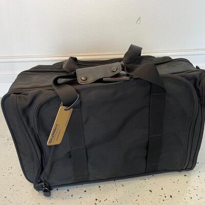 Lot 135. TUMI Expanding Suitcase