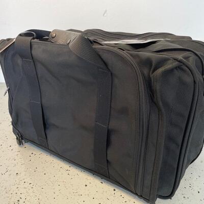 Lot 135. TUMI Expanding Suitcase