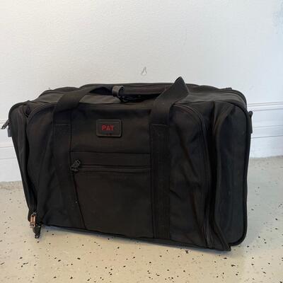 Lot 135. TUMI Expanding Suitcase