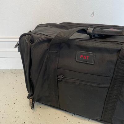Lot 135. TUMI Expanding Suitcase