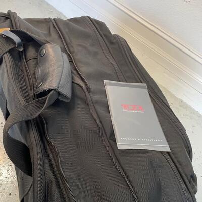 Lot 135. TUMI Expanding Suitcase