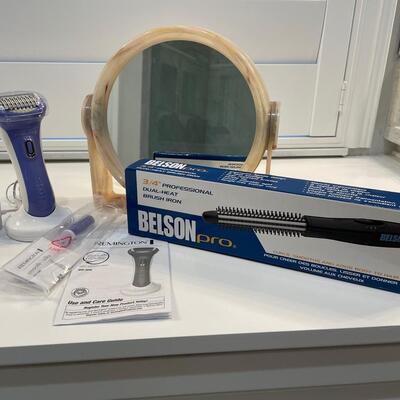 Lot 162. Remington Lady Razor, Brush Iron and 10X mirror