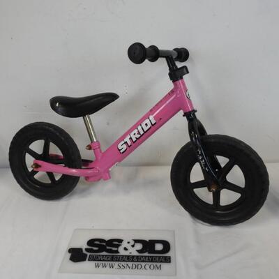Pink Strider Balance Bike, No Pedals Leg Powered 10 Inch Diameter Wheels