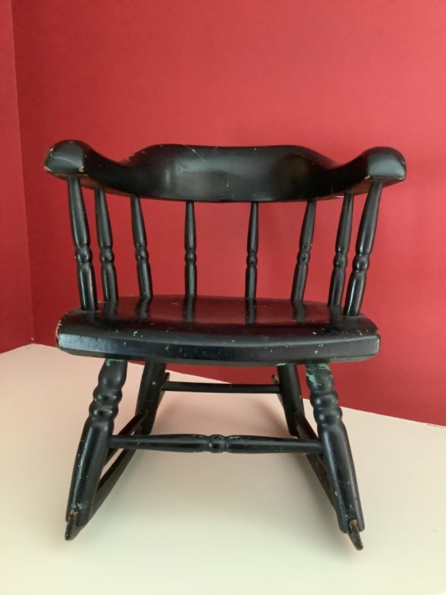 D918 Antique Childs Black Captains Rocking Chair | EstateSales.org