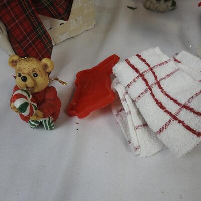 Christmas Decorated Sleds, Santa Figurines, Candles, Baskets with Faux Flowers