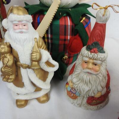 Christmas Decorated Sleds, Santa Figurines, Candles, Baskets with Faux Flowers