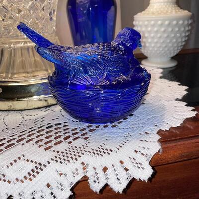 Cobalt blue bird on nest cheese dish