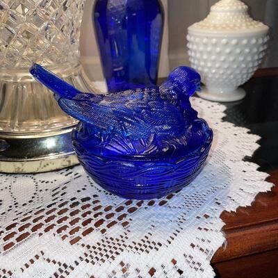 Cobalt blue bird on nest cheese dish