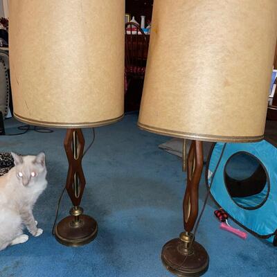 Pair of matching mid century brass and danish wide lamps.