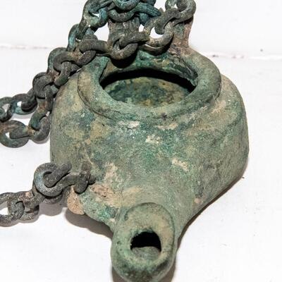 ANCIENT CAST METAL OIL LAMP