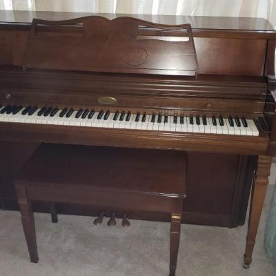 Wurlitzer piano with bench