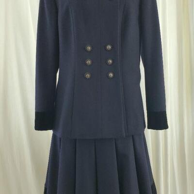 Navy Chanel wool and alpaca-blend skirt and double-breasted jacket with structured shoulders, velvet collar and cuffs, dual vent and...