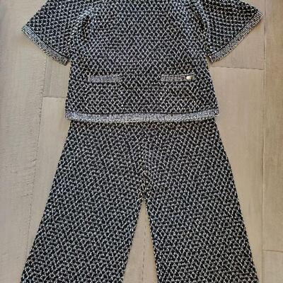Chanel black and white silk & cotton crew neck blouse and wide crop pants.