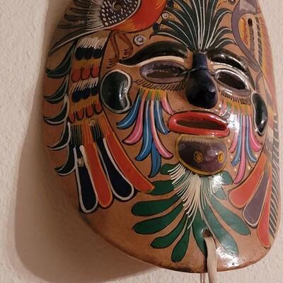Lot 37: Vintage Handpainted Terracotta Mask with Leather & Bell Adornment