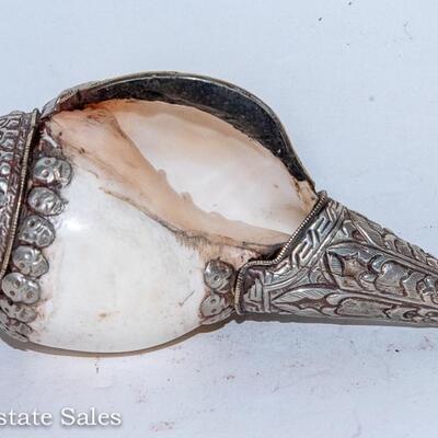 UNIQUE METAL ENCASED SHELL