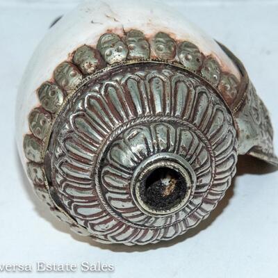 UNIQUE METAL ENCASED SHELL