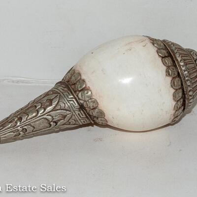 UNIQUE METAL ENCASED SHELL