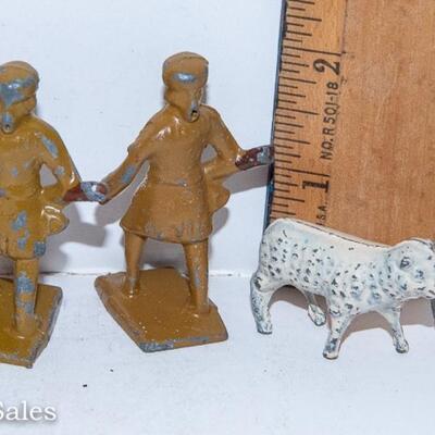 Group of NINE Cast Lead Soldier Figurines