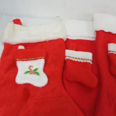 14 Christmas Stockings: 7 Large, 7 small.