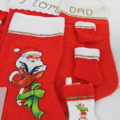 14 Christmas Stockings: 7 Large, 7 small.