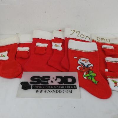 14 Christmas Stockings: 7 Large, 7 small.