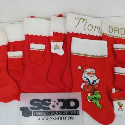 14 Christmas Stockings: 7 Large, 7 small.