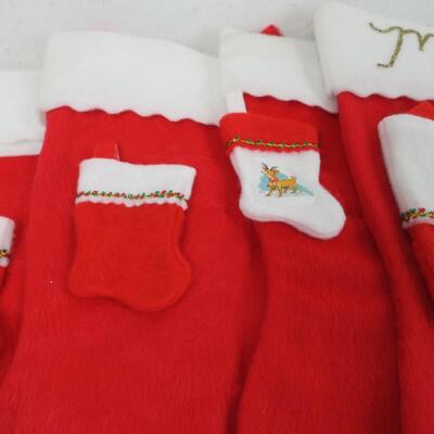 14 Christmas Stockings: 7 Large, 7 small.