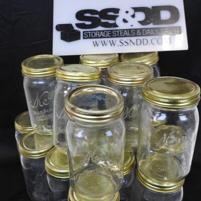 18 Kerr Glass Jars, 17 Lids , 7 Inches by 4 Inches