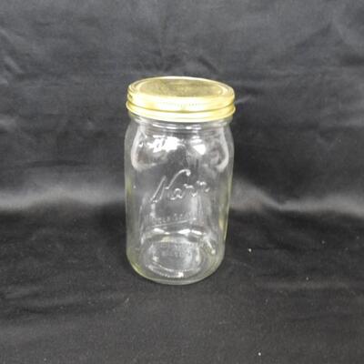 18 Kerr Glass Jars, 17 Lids , 7 Inches by 4 Inches