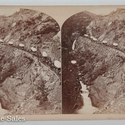 COLORADO STEREOVIEW - COVERED WAGONS DESCENDING PIKES PEAK