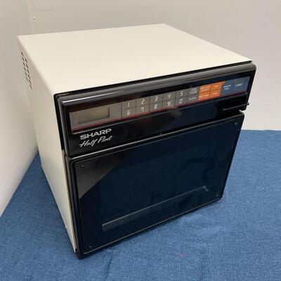 LOT 404.  SHARP HALF PINT MICROWAVE OVEN