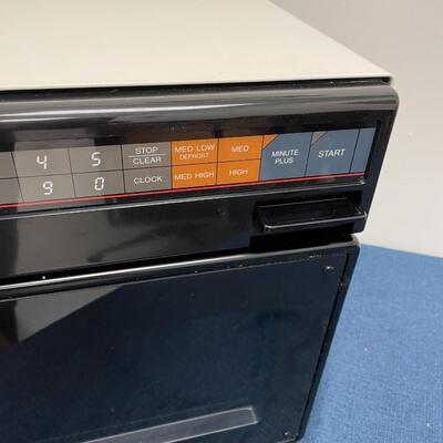 LOT 404.  SHARP HALF PINT MICROWAVE OVEN